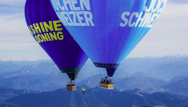 German Duo Sets World Record Walking Tightrope at 8,202 Feet